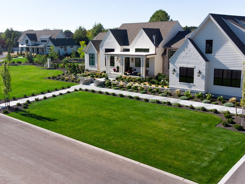 Aerial view of a fresh front-yard landscape install