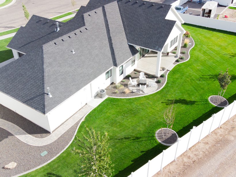 Clean front yard and circular drive from above