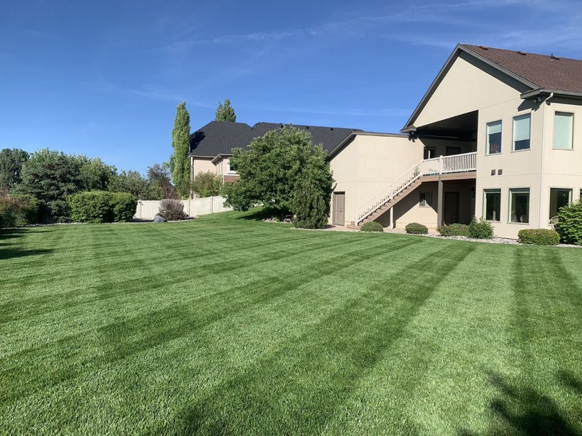 Lush mowed lawn beside an Idaho Falls home